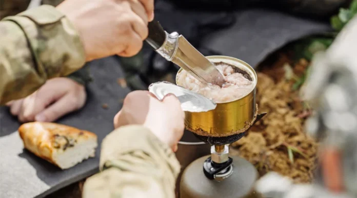 Navy-seal-cooking-canned-food-over-a-gas-burner